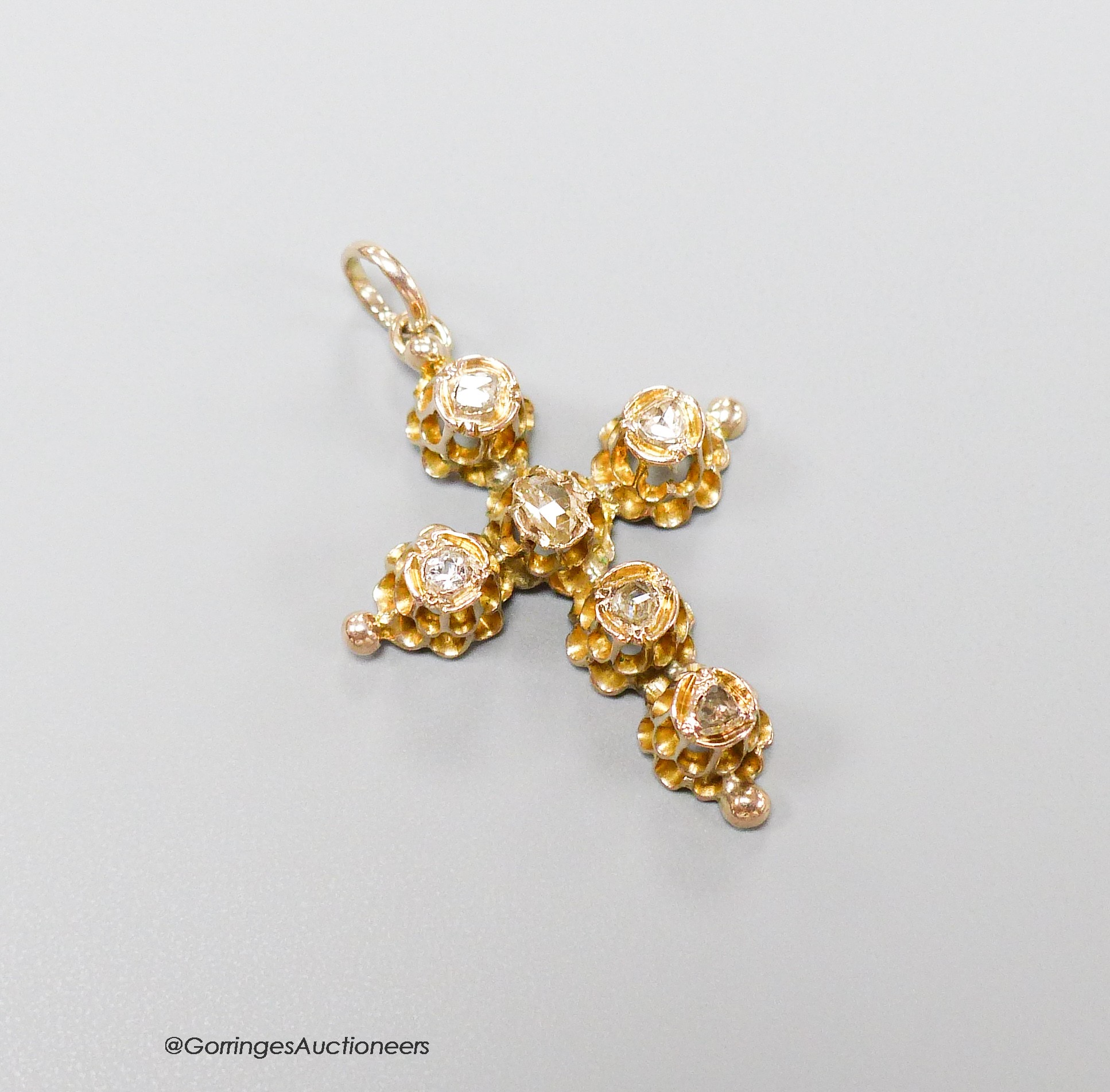 Am antique yellow metal and six stone rose cut diamond set cross pendant, 30mm, gross 2.6 grams.